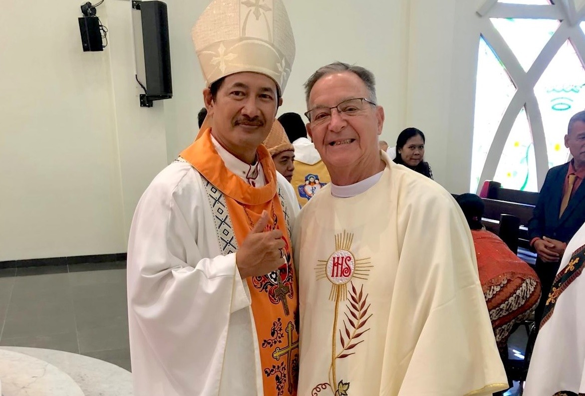 Fr. Mark Fortner SCJ is pictured (right) during a recent visit to Indonesia, where he served for 30 years. At his left is Bishop Vincentius Setiawan Triatmojo, whom he baptized as an infant in 1971.